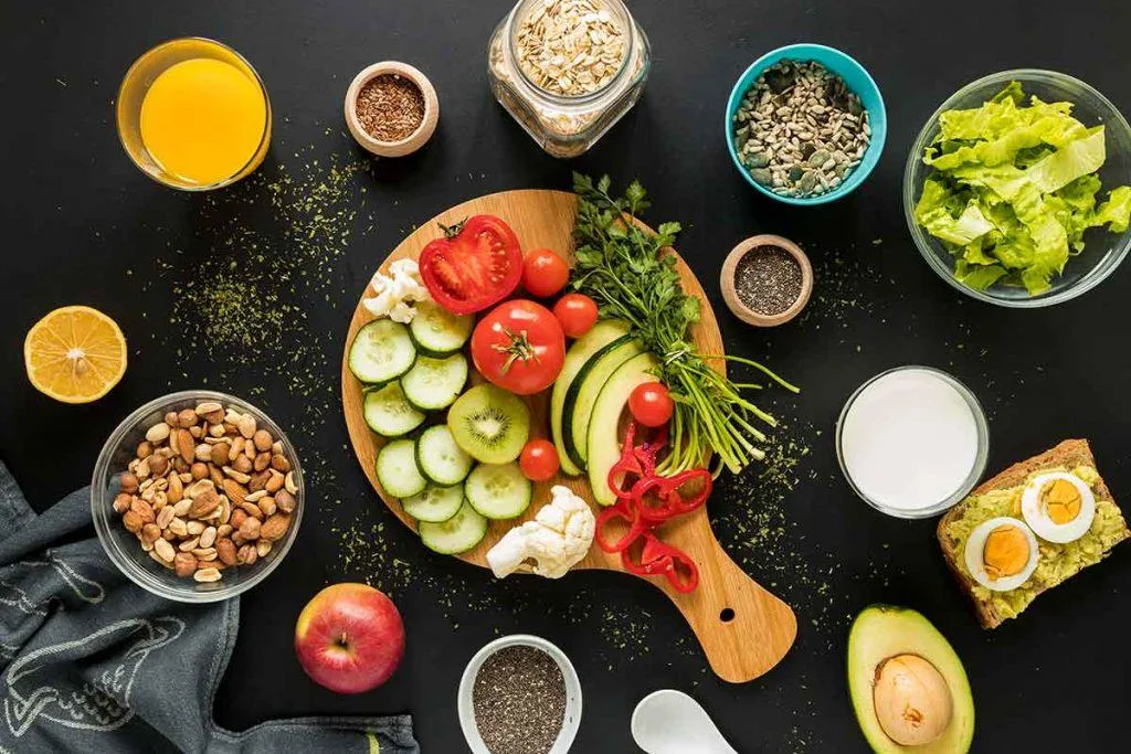 Fresh whole foods arranged for a balanced nutrition plan